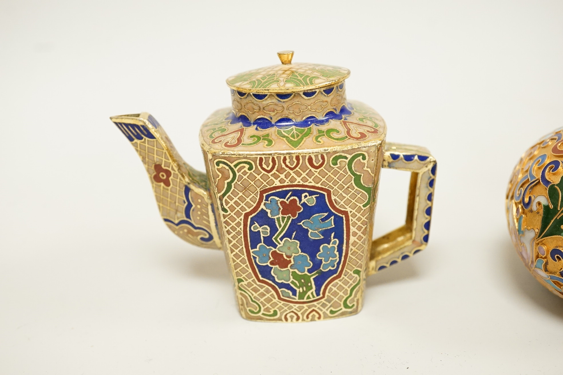 A collection of miniature enamel and cloisonné boxes, eggs and a painted rabbit, etc. (11)